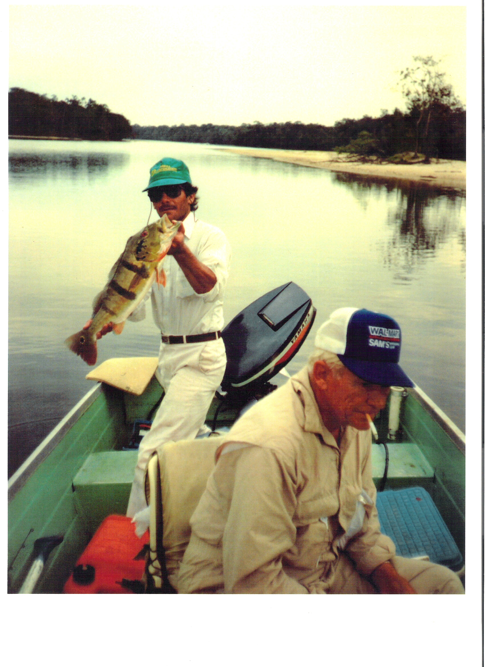 Bud Walton with his peacock bass in the Amazon